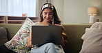 Happy, Indian woman and laptop with credit card for online shopping, banking or payment on sofa at home. Excited female person with smile, computer or debit for ecommerce on couch in living room