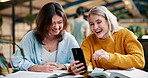 Student, laugh and cellphone in library for social media, gossip and online on campus. Technology, smartphone and communication from digital app for female friends, school and break for study or exam