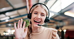 Happy woman, call center and consulting with headphones in online advice, customer service or support at office. Portrait or POV of female person, consultant or agent waving with smile for assistance