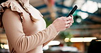 Woman, phone and hands typing on social media, online shopping and check email or networking. Female person, designer and app for virtual conversation, chat and writing message or website at work