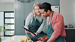 Tablet, video and healthy cooking in kitchen with couple reading ebook, app and online learning. Happy, man and woman relax with tech in home and watch meal prep info with fruit and vegetables