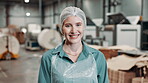Woman, face and warehouse worker for packaging manufacturing with hair net, hygiene or distribution. Female person, portrait and factory storage as employee with product order, delivery or import