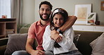 Home, portrait and couple with hug on sofa for family picture, commitment and bonding together. Happy people, man and woman with smile on couch for photography, romance and affection in relationship