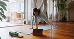 Woman, tablet and yoga balance or online for virtual class or stretching arms for pilates, wellness or streaming. Female person, home and zen mindfulness in apartment on digital app, morning or calm