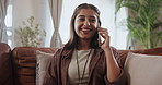 Indian woman, phone call and home talking on sofa for relax communication with hello, gossip or chatting. Female person, cellphone and living room conversation for networking, contact or apartment