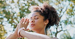 African woman, meditation and yoga in park for peace, healing and wellness with eyes closed and praying hands. Young person or yogi with mindfulness, calm and holistic health in park or outdoor