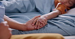 Hospital, holding hands and mother with child for care, support and comforting with love. Family, healthcare and mom with kid in bed for medical service, treatment and wellness recovery in clinic