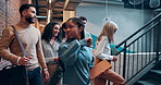 Walking, group and business people in office on stairs for meeting, teamwork and collaboration. Creative company, modern building and men and women arrive in conversation, discussion and talking