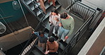 Business people, office and stairs above at a creative company agency with staff and walking. Communication, cooperation and workforce of a public relations workplace at startup with management