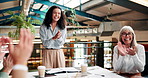 Teamwork, presentation and business people applause in meeting for success, victory and achievement. Creative startup, collaboration and men and women for good news, bonus and winning in restaurant