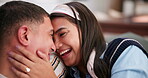 Happy, couple and embrace with love in home for healthy relationship, communication and care. Smile, man and woman with hug in living room for bonding, commitment and peace in romance together