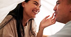 Love, laughing and home in sweet couple with blanket for romance, relationship or intimate together. Smile, marriage and young man with woman in bedroom for happiness, commitment or bonding in house