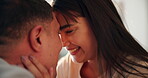 Romantic, couple and love with affection, smile and lens flare in home for relationship, cuddle and close. Woman, man and cheerful as lovers in closeup for bonding in bedroom in embrace for together