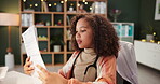 Girl, child and role play for doctor with stethoscope in office with paperwork, imagination and fantasy. Medical professional, kid and acting in workplace for healthcare support, medicine or document