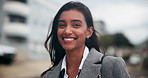 Portrait, wind and business woman in city with hair, confidence and professional worker laughing in India. Face, entrepreneur and smile of advisor in urban town outdoor for travel and morning commute