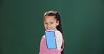 Phone screen, face or girl child in studio with mockup for gaming, streaming or online competition on green background. Portrait, space or model show app for menu, choice or kids safety lock feature
