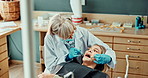 Woman, dentist and mirror for examination in mouth, oral hygiene and cleaning or consultation on tooth. Female person, assessment and orthodontic inspection for dental care, patient and tool to check