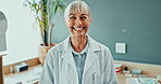 Portrait, happy dentist and woman in dental clinic for healthcare, wellness or medical service. Face, stomatology and smile of mature doctor for orthodontics, oral hygiene and teeth care in Canada