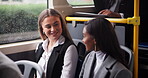Business, woman and friends on bus to city as corporate professionals for public transport, talking or delay. Female people, window and raining downtown for urban commute or morning, job or traffic