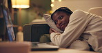African woman, laptop and movie on sofa to relax in night for vacation, break and online subscription in home. Girl, person and computer for film, series and screen with smile on couch in living room