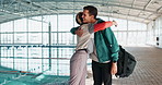 Friends, greeting and hug for hello, happy reunion or meeting at swimming pool. Sports, swimmer and athlete woman with man hugging for training challenge, fitness or hangout after morning workout