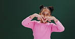 Heart, sign and face of girl in studio on dark background and like fashion or creative clothes. Care, hands and child with energy to show kindness, love and support with cool gen z style in mockup