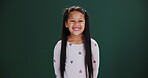 Happy, girl and face of child in studio on green background back to school with excited energy. Education, portrait and kid at academy for learning or growth of gen z student with style or fashion