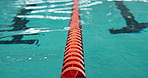 Closeup, race lines and swimming pool for fitness in professional, gym and practice for competition as athletes. Aquatic sports, workout and wellness in underwater for cardio, activity or exercise