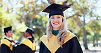 University, smile and face of woman with graduation on campus for education, celebration or degree. Bokeh, portrait and happy student for achievement, satisfaction or academic growth at school