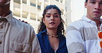 Face, city and group with fashion, friends and urban town with gen z, serious and streetwear. Portrait, woman and men in New York, support and students with trendy outfit, stylish clothes and culture
