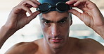 Face, prepare and swimmer with goggles, swimming cap or athlete for morning workout. Sports wellness, portrait and hands of person for performance training, water competition or confidence in race