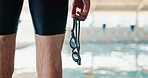 Man, swimmer and legs at pool for exercise, goggles and ready for workout or training. Male person, athlete and sports challenge for race, fitness and practice performance for healthy competition