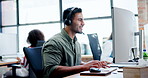 Happy man, consultant and call center with headphones in tech support, telemarketing or customer service at office. Friendly male person, employee or young agent for online advice, help or assistance