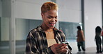 Smile, black woman and smartphone on campus for social media, communication or scroll internet. Connectivity, dance student and gen z girl with mobile phone for chat online, texting or search app