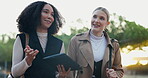 Colleagues, people and walking with tablet outdoor for commuting to work, discussion and online schedule. Happy, coworker and smile with career chat, networking and communication at park in New York