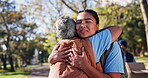 Mature mom, daughter and happy with hug in park for bonding, support and care in New York. Women, outdoor and smile as family together to relax, break and fun with compassion, affection and love