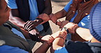 People, wrist and hands outdoor for teamwork on community service or program, collaboration and solidarity. Diversity, huddle and together to volunteer for charity or social justice and unity support