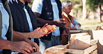 Volunteers, food package and charity in outdoors, team and community service for social responsibility. People, donation and grocery bags for society project, ngo and teamwork for accountability