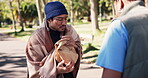 Man, begger and volunteer with food outdoor for feeding needy or homeless, support and humanitarian gesture for kindness. Team, handout and donation for charity or less fortunate, community and park.