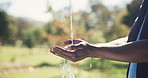 Nature, water and farmer washing hands with hygiene, outdoor health and worker in agriculture. Cleaning dirt, germs and bacteria on fingers, person on farm with splash and skin care in gardening.