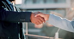 Man, woman and handshake outdoor for business partnership, deal or welcome to corporate career, hiring and recruitment. People, agreement and shaking hands for b2b contract, greeting and well done.