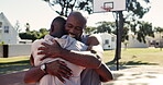 Man, basketball court and coach outside, father and son for bonding in sport with support for game. Greeting, hug and happy for wellness or fitness, energy and training together with athlete player