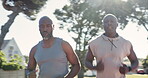 Black men, practice and run for workout, exercise and fitness for health and wellness. Athlete, coach and cardio with New York nature park, sport and marathon training for body motion and muscle