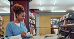 Woman, celebrate and medical student with laptop for education, good news or positive test results in library. Happiness, wow and excited black person for scholarship, celebration or internship