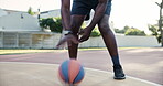 Man, outside and playing with basketball in court, Fitness and health for cardio sport in neighbourhood. Dribble, practice and motion for wellness, energy and player training for competition workout