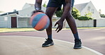 Man, outside and hands with basketball in court, Fitness and health for cardio sport in neighbourhood. Dribble, practice and motion for wellness, energy and player training for competition workout