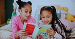 Kids, girl or siblings reading book on bed with love, care and learning with fun bonding in their home. Family, children and child with fairytale for storytelling, teaching or fantasy in a bedroom