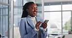 Laughing, smartphone and black woman in office for social media post, networking or internet meme. Business, funny and employee at advertising agency for conversation, texting or browsing website