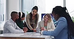 Collaboration, meeting and paper with business people in boardroom of office for discussion or planning. Brainstorming, documents and project management with employee team in workplace together