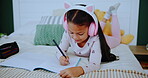 Child, headphones and girl with book in home, music and drawing or writing on bed for childhood development. Growth, creative sketch and education homework, online streaming and audio or listening